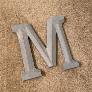 12" by 12" Gray wash wooden “M”
